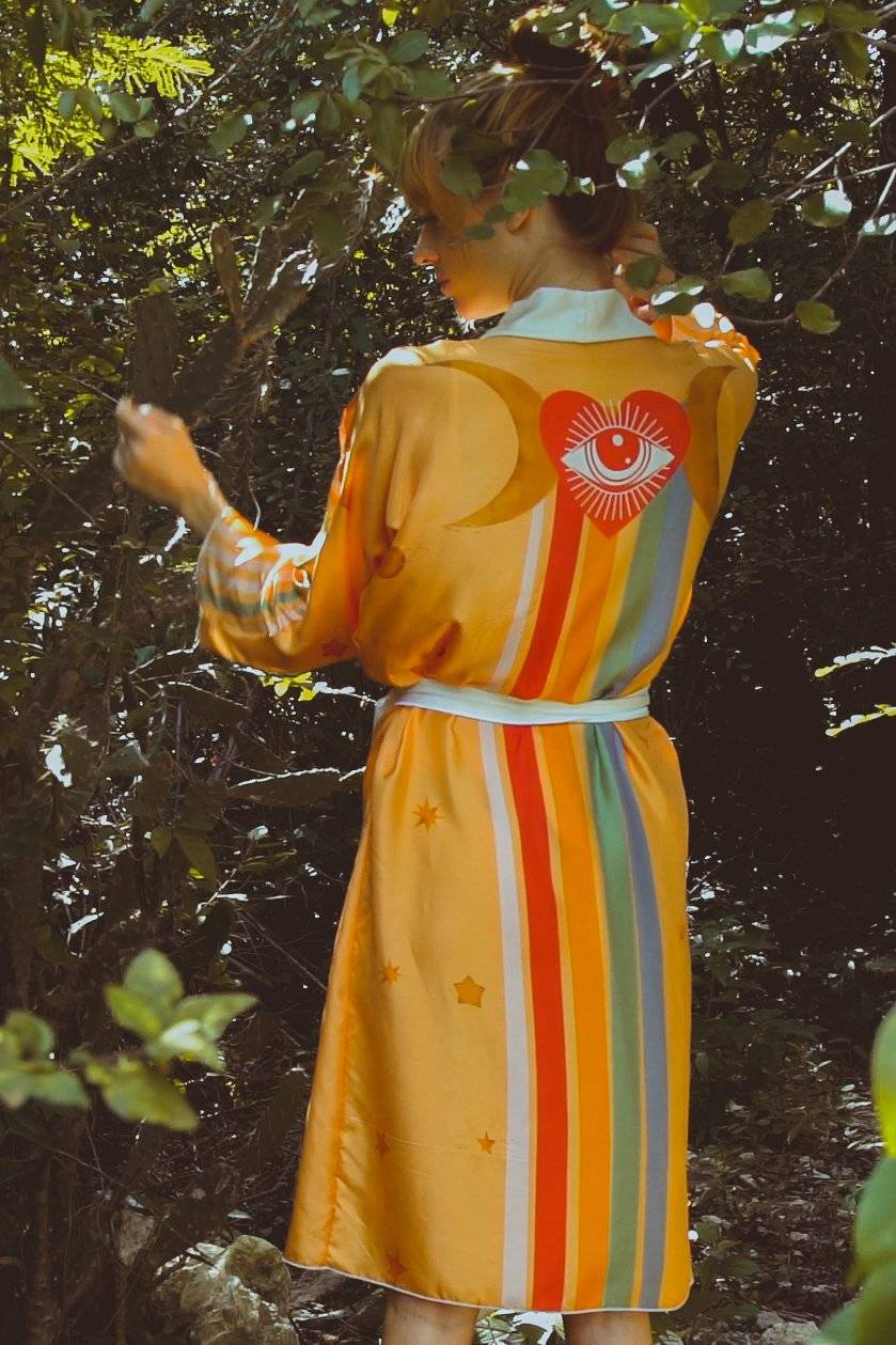 Royal RobeHolding Court IncIntroducing the The Royal Robe in Yucatan Rainbow, a tailored, bespoke kimono crafted from lightweight silk. Perfect for Summer Fashion, this kimono combines elegancPeignoirThe Royal Robe in Yucatan RainbowHolding Court INCHolding Court INCHolding Court INC