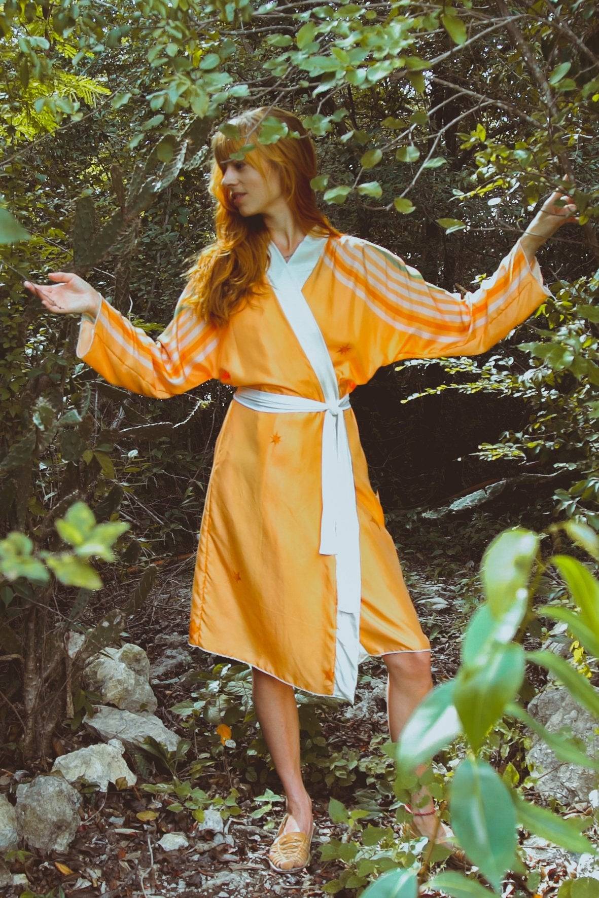 Royal RobeHolding Court IncIntroducing the The Royal Robe in Yucatan Rainbow, a tailored, bespoke kimono crafted from lightweight silk. Perfect for Summer Fashion, this kimono combines elegancPeignoirThe Royal Robe in Yucatan RainbowHolding Court INCHolding Court INCHolding Court INC