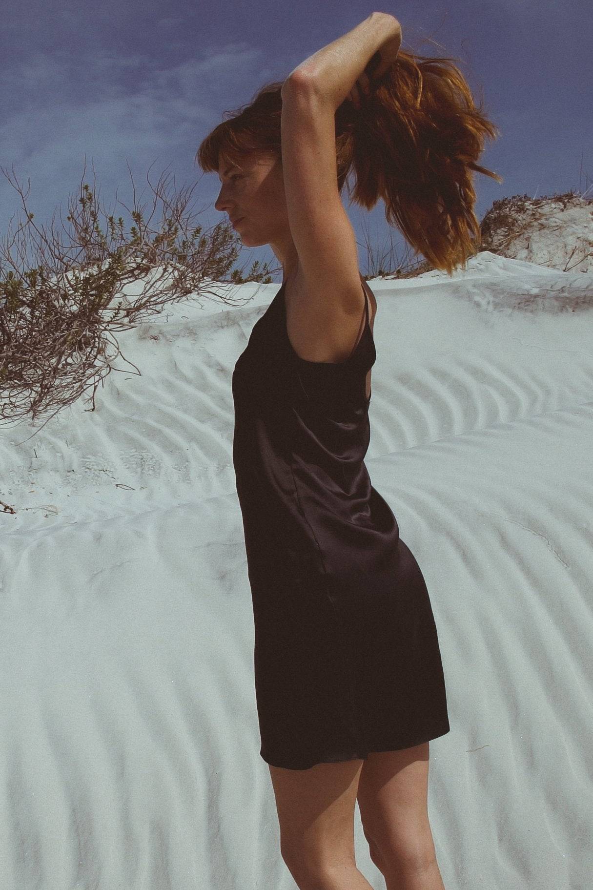 Vela Silk Dress - Jet BlackHolding Court IncYour basic black silk slip dress is never simple. Â
Made-to-order artist prints make this truly exclusive, you won't have competition here.Â
We're proud to bring youDressVela Silk Dress - Jet BlackHolding Court INCHolding Court INCHolding Court INC