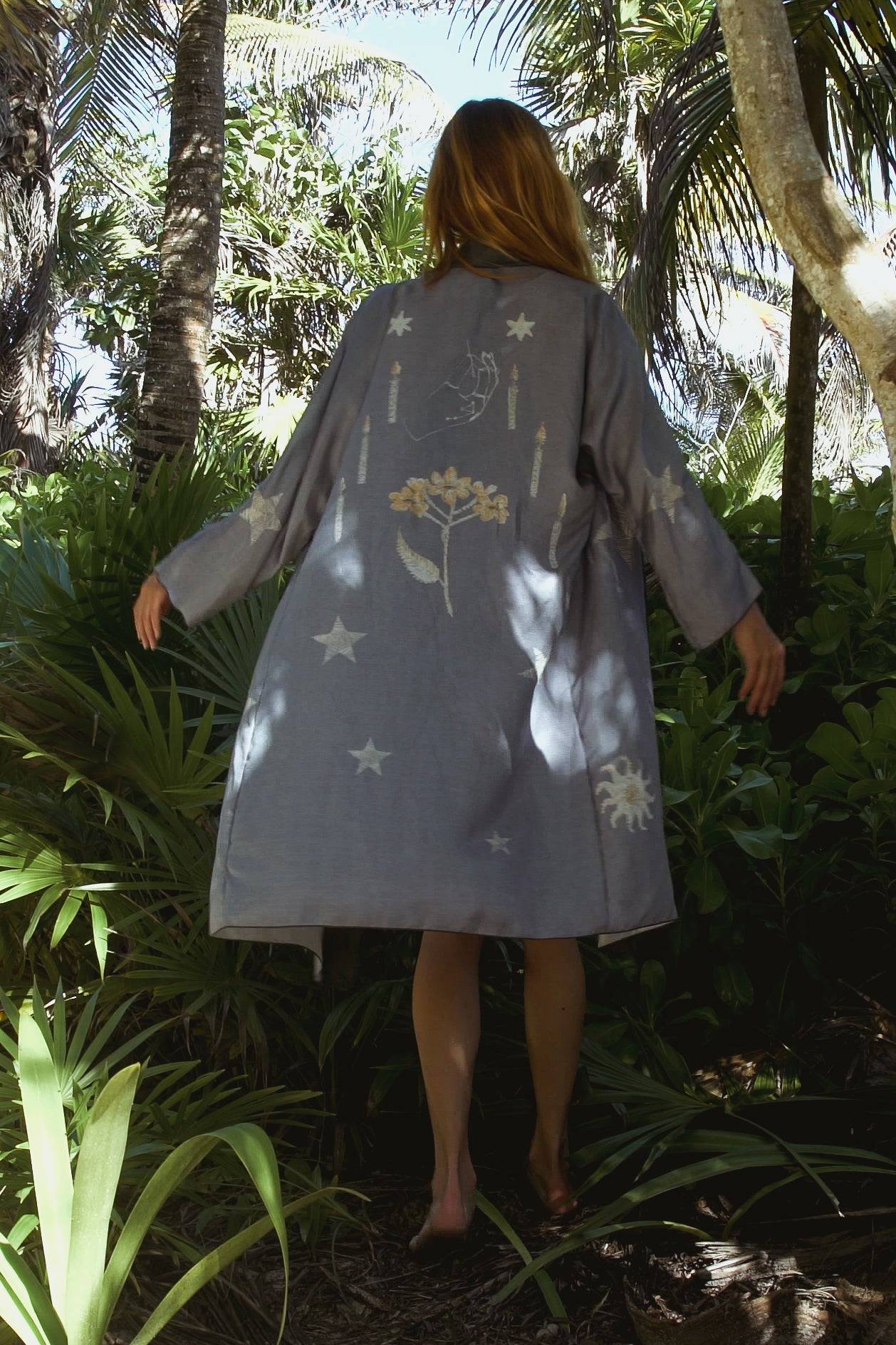 Sky View BlueHolding Court IncThe Royal Robe in Sky View Blue, a tailored, a bespoke kimono crafted from lightweight silk, is perfect for Summer Fashion.  This kimono combines elegance with comfoPeignoirThe Royal Robe in Sky View BlueHolding Court IncHolding Court IncHolding Court Inc