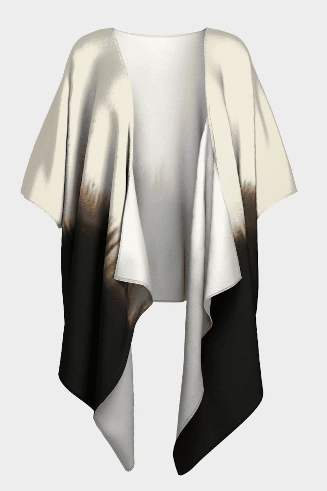 Black and white draped garment on a light gray background