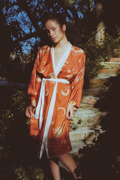 Royal RobeHolding Court IncIntroducing the The Royal Robe in Dawn, a tailored, bespoke kimono crafted from lightweight silk. Perfect for Summer Fashion, this kimono combines elegance with comfPeignoirThe Royal Robe in DawnHolding Court INCHolding Court INCHolding Court INC