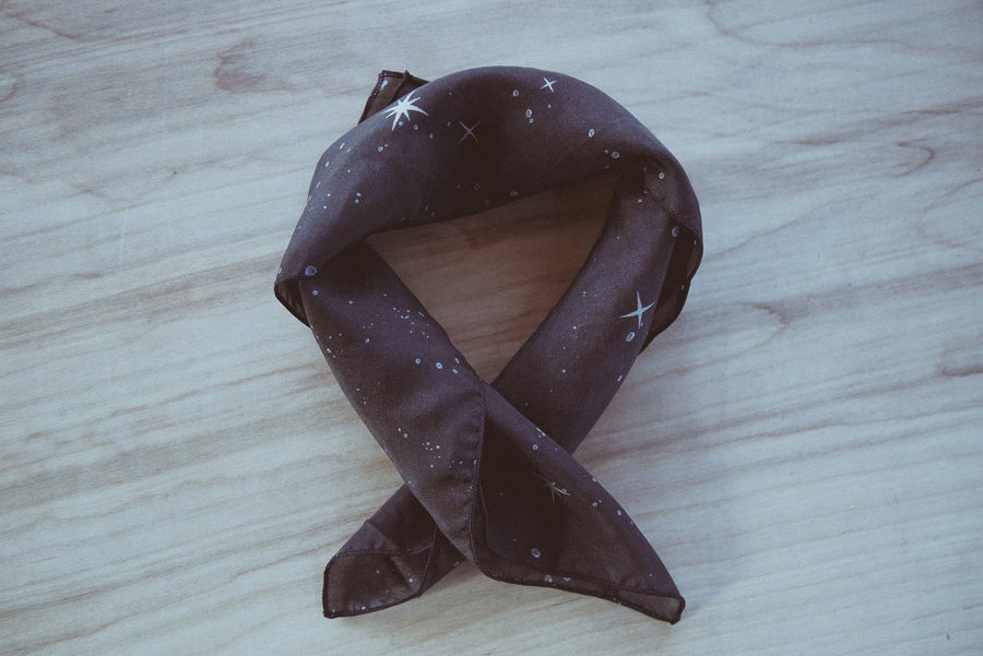 Flat-lay of the Cosmic Connections Night Scarf — natural-fiber silk scarf in Oeko-Tex certified silk, designed by Courtney Barriger for Holding Court Inc.