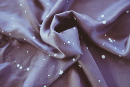 Blue Stardust ScarfHolding Court IncStar born. Our Blue Stardust Scarf is made of Silk Charmeuse, and it is light, flowing with a sweet sheen.
It is the perfect light weight silk scarf. Tie it in your Square ScarfBlue Stardust ScarfHolding Court INCHolding Court INCHolding Court INC