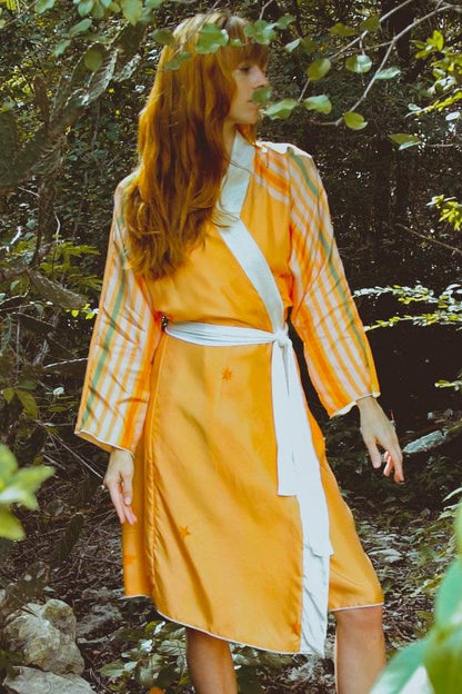 Royal RobeHolding Court IncIntroducing the The Royal Robe in Yucatan Rainbow, a tailored, bespoke kimono crafted from lightweight silk. Perfect for Summer Fashion, this kimono combines elegancPeignoirThe Royal Robe in Yucatan RainbowHolding Court INCHolding Court INCHolding Court INC